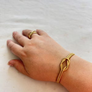 Knoop armband - goud kleur