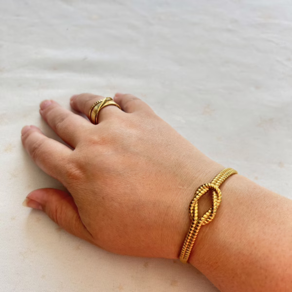 Knoop armband - goud kleur